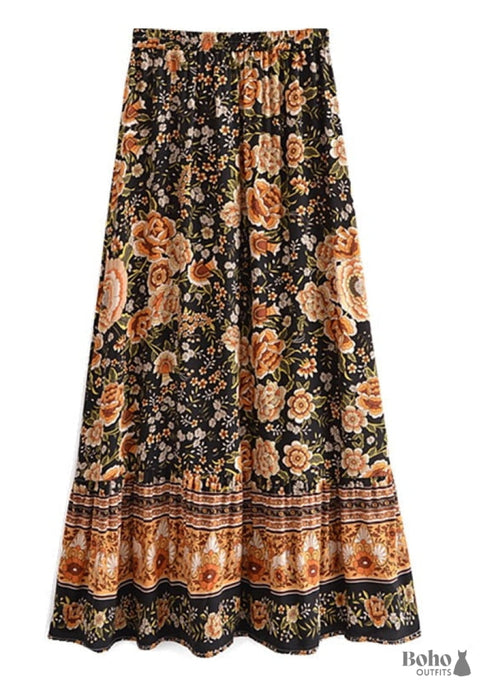 Faldas bohemias con estampado Maryam de flores negras y doradas para mujer